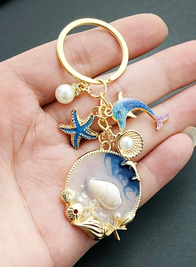 SHEIN 1pc Unisex Marine Animal Keychain Sea Star Shell Pearl Dolphin Pendant Charm Beach