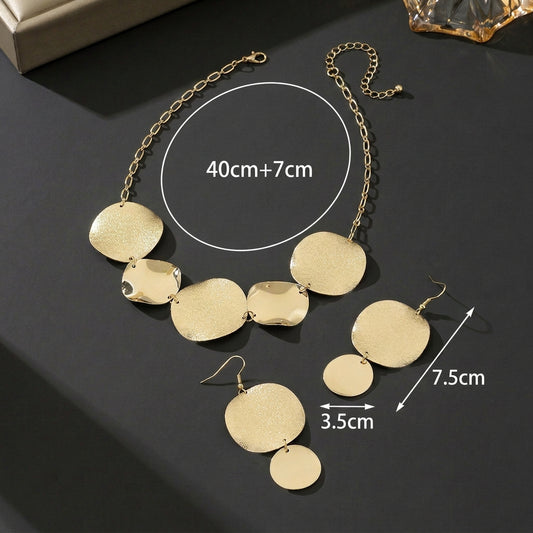 Modern Geometric Gold Disc Jewelry Set – Necklace, Earrings & Bracelet